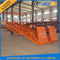 6 ton - 15 ton Hydraulic Trailer Ramp Lift dengan Anti Slip Corrugated Baja Kerja Landasan
